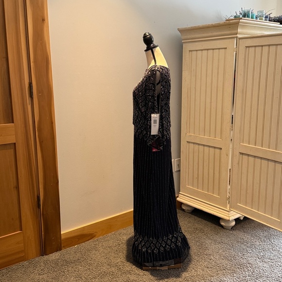 NWT Pisarro Nights beaded split sleeve gown.
6P Navy Blue - Picture 2 of 7